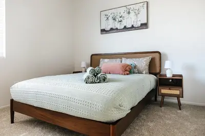 a bedroom with a bed with pumpkins on it at Pearl 2B apartment in Marina with parking, Pool and Gym in Los Angeles