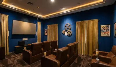 a waiting room with chairs and a flat screen tv at Marina del Rey Family 1BA & 2BA - Pool, Spa and Gym Access in Los Angeles
