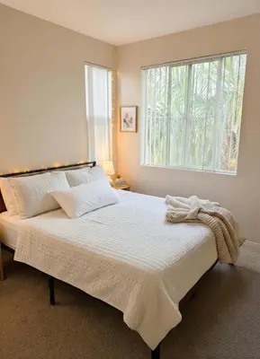 a bedroom with a large bed with a window at Marina del Rey 1BA & 2BA Getaway - Pool - Spa - Gym in Los Angeles