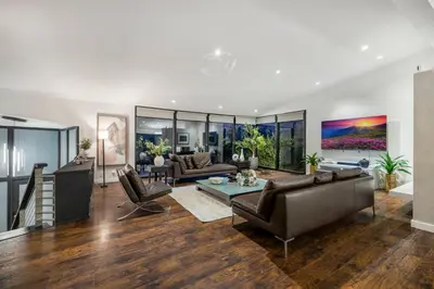 a living room with a couch and a table at Shirley Lane in Los Angeles