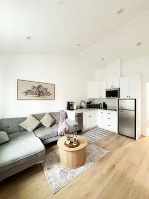 a living room with a couch and a table at Relaxing 2BR Escape in Trendy West LA - CM-CAL in Calabasas