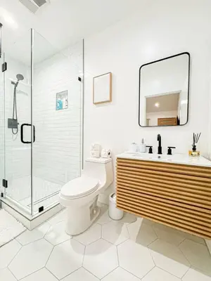 a bathroom with a shower and a toilet and a sink at Relaxing 2BR Escape in Trendy West LA - CM-CAL in Calabasas
