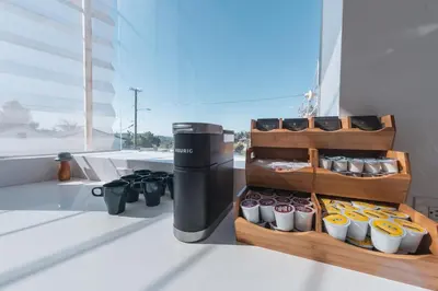 a kitchen counter with a container of cupcakes at Industrial&Stylish 3 bedroom 3 bathrooms Home With Views and Hot tub in Los Angeles