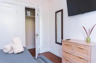 a bedroom with a dresser and a mirror at Charming Vintage 2 bedroom 1 Bathroom Close to Larchmont Village in Los Angeles