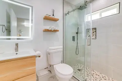 a bathroom with a shower and a toilet and a sink at Work and Play! Apt Less Than 1 Mi to Chino Valley Hospital in Chino