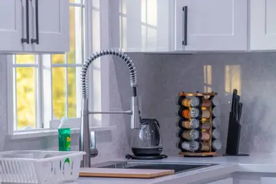 a kitchen counter with a sink and a kitchen sink at Cozy Comfort LA House with Stunning Scenic Views in Monterey Park