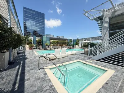 a pool on the roof of a building at Luxury Loft Living 1BR in Trendy Complex -113-GL in Glendale