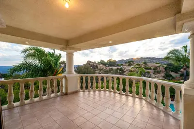a balcony with a view of the mountains at Mountain View Luxury Estate with Pool in West Hills in Chatsworth Lake Manor