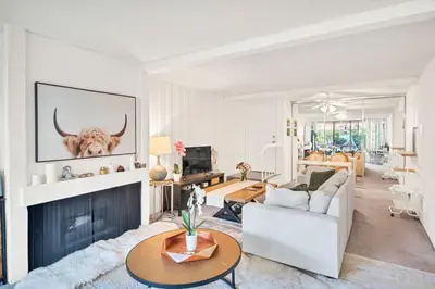 a living room with a couch and a fireplace at Lux Marina Village with parking in Los Angeles