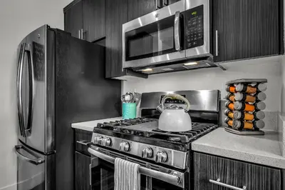 a kitchen with a stove and a tea kettle at Heart of La, Walk to everything!! in Los Angeles