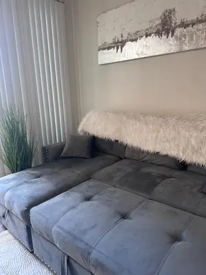 a large bed in a room with a large window at Marina del Rey 1BR apt Ocean Walk, Pool, Hot Tub, Gym, BBQ, Lagoon, Sunset Views in Los Angeles