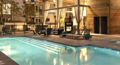 a large swimming pool in a building at Marina del Rey 1BR apt Ocean Walk, Pool, Hot Tub, Gym, BBQ, Lagoon, Sunset Views in Los Angeles