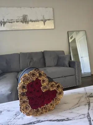 a heart shaped box on a table in a living room at Marina del Rey 1BR apt Ocean Walk, Pool, Hot Tub, Gym, BBQ, Lagoon, Sunset Views in Los Angeles