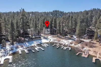 a red marker in the air over a lake at Cove Lakeside Jacuzzi, Central AC, Stunning View in Big Bear Lake