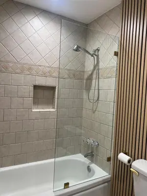 a bathroom with a shower and a bath tub at Hanna's Corner in Canoga Park
