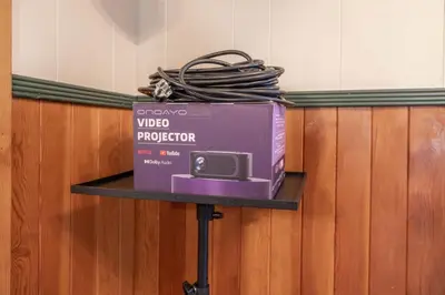 a box sitting on a table in a room at Dream Lake Cabin Spa, EV Charger, Gated, by lake! in Big Bear Lake