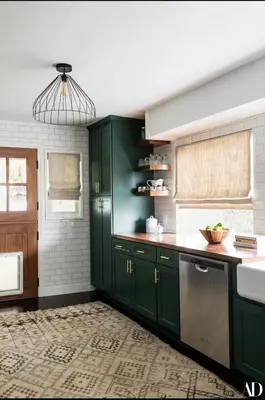 a kitchen with green cabinets and a sink at The Whitley Heights Sweet Escape With Jacuzzi and parking in Los Angeles