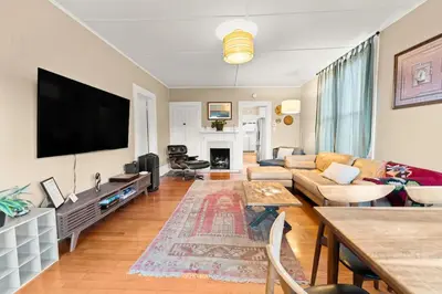 a living room with a large flat screen tv at Ocean View, Hot Tub, Sauna, Beach Bikes in Ventura
