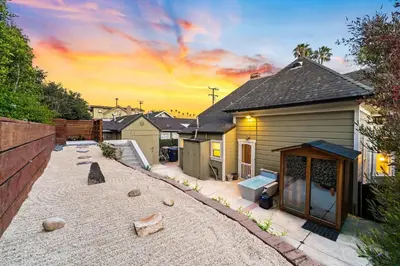a backyard of a house with a house at Ocean View, Hot Tub, Sauna, Beach Bikes in Ventura