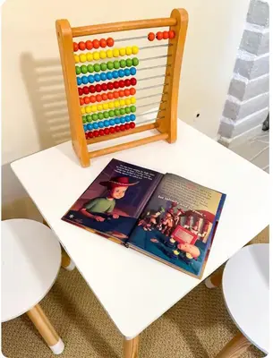a toy table with a book and an abacus at Modern Private 3B-2BA Home and Spacious Yard in Lancaster