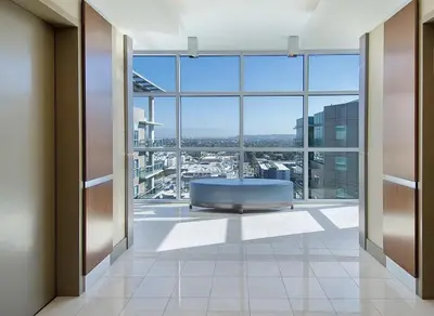 a large room with a tub and a large window at Platinum Suites - Gym & Pool & Hot Tub & BBQ in Los Angeles