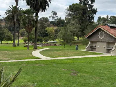 a park with a building and a path at 3-Bedroom Luxury Villa Near Dodger Stadium, Downtown LA Free Parking in Los Angeles