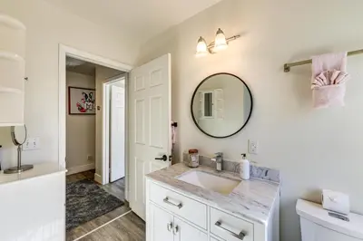 a bathroom with a sink and a mirror at Beautiful Lake-View House Walk to Lake and Village! in Big Bear Lake