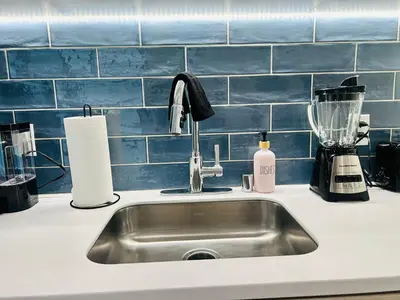 a kitchen counter with a sink and a blender at Heart of Hollywood Walk of Fame - Free Parking, Pool, Gym, Rooftop Views, centrally located, WIFI in Los Angeles
