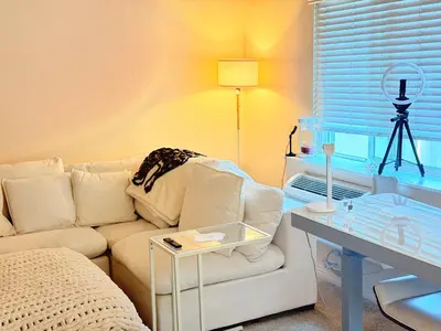 a living room with a couch and a table at Luxury stay by Gaia Homes in Los Angeles