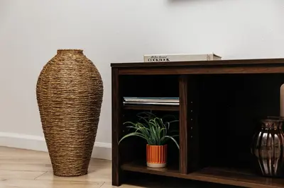 a large wicker vase sitting next to a table at Ocean Breeze Retreat in Los Angeles