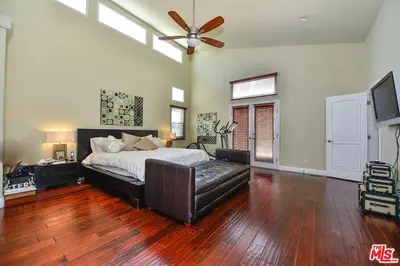 a bedroom with a bed and a ceiling fan at Beautiful, Spacious Agoura Malibu Zen House in Agoura Hills