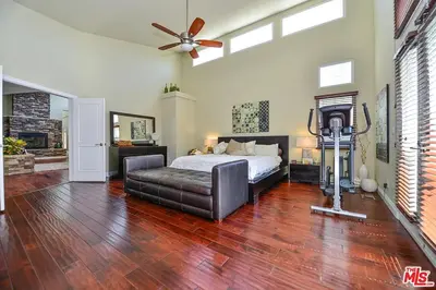 a bedroom with a bed and a ceiling fan at Beautiful, Spacious Agoura Malibu Zen House in Agoura Hills