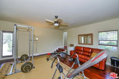 a living room with a couch and a gym at Beautiful, Spacious Agoura Malibu Zen House in Agoura Hills