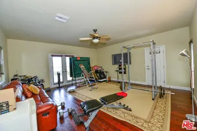 a living room with a couch and a gym at Beautiful, Spacious Agoura Malibu Zen House in Agoura Hills