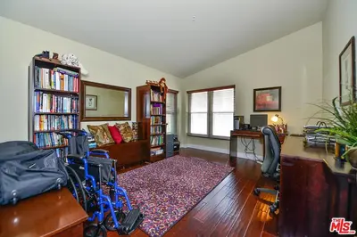 a living room with a wheelchair in the middle of a room at Beautiful, Spacious Agoura Malibu Zen House in Agoura Hills