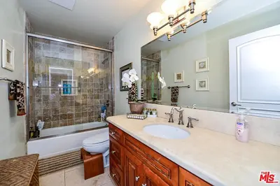 a bathroom with a sink and a toilet at Beautiful, Spacious Agoura Malibu Zen House in Agoura Hills