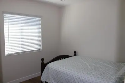 a bedroom with a bed and a window at Newly Renovated La Habra 3bed 2 Bath in La Habra