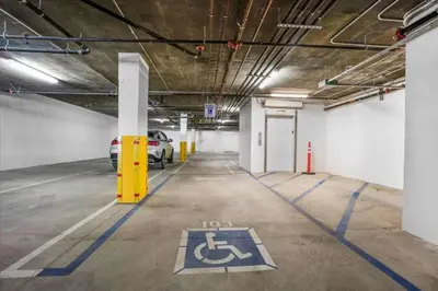 a parking garage with a car parked in it at Newly Built Pasadena Retreat Parking Great Location in Pasadena