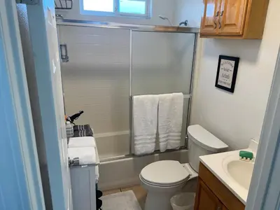 a small bathroom with a toilet and a sink at 8670 San Carlos - South Gate CA - The Best 2 Rooms in South Gate