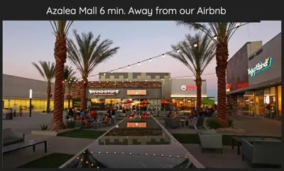 a mall with palm trees and people sitting in chairs at 8670 San Carlos - South Gate CA - The Best 2 Rooms in South Gate