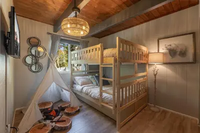 a room with two bunk beds in a house at The Great Escape Beach Access, Near Slopes, View in Lake Arrowhead