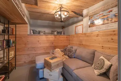 a living room with a couch and a table at The Great Escape Beach Access, Near Slopes, View in Lake Arrowhead