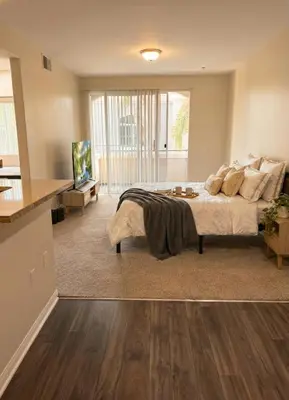 a large bedroom with a bed and a television at 1BR Luxury Apartment - Luxury Resort Amenities in Los Angeles