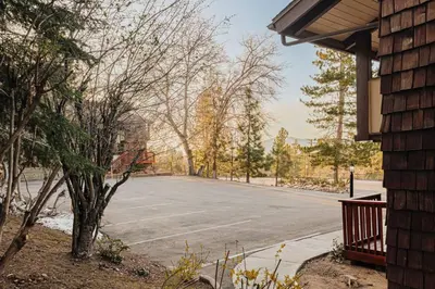 a basketball court in front of a house at Solace Cabin in Big Bear Lake