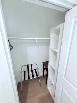 a walk in closet with a chair and a table at Private 1BR 1BA Suite, Kitchen, Fireplace, Parking in Simi Valley