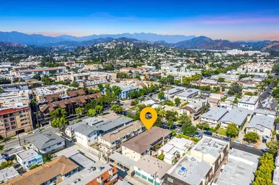 an aerial view of a city with a yellow arrow at Unwind in Spacious 2BR Apt Sleeps 6 with Parking in Glendale