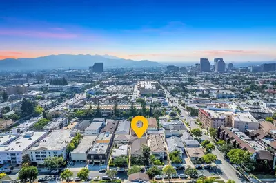 an aerial view of a city with a yellow street sign at Luxury 3BR Condo Near Americana and Galleria in Glendale