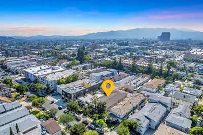 an overhead view of a city with a yellow arrow at Relax in Spacious 3BR Apt Sleeps 8 and Parking in Glendale