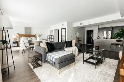 a living room with a couch and a table at Luxury Spacious Studio in Los Angeles