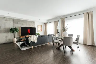 a living room with a couch and a table at Luxury Spacious Studio in Los Angeles
